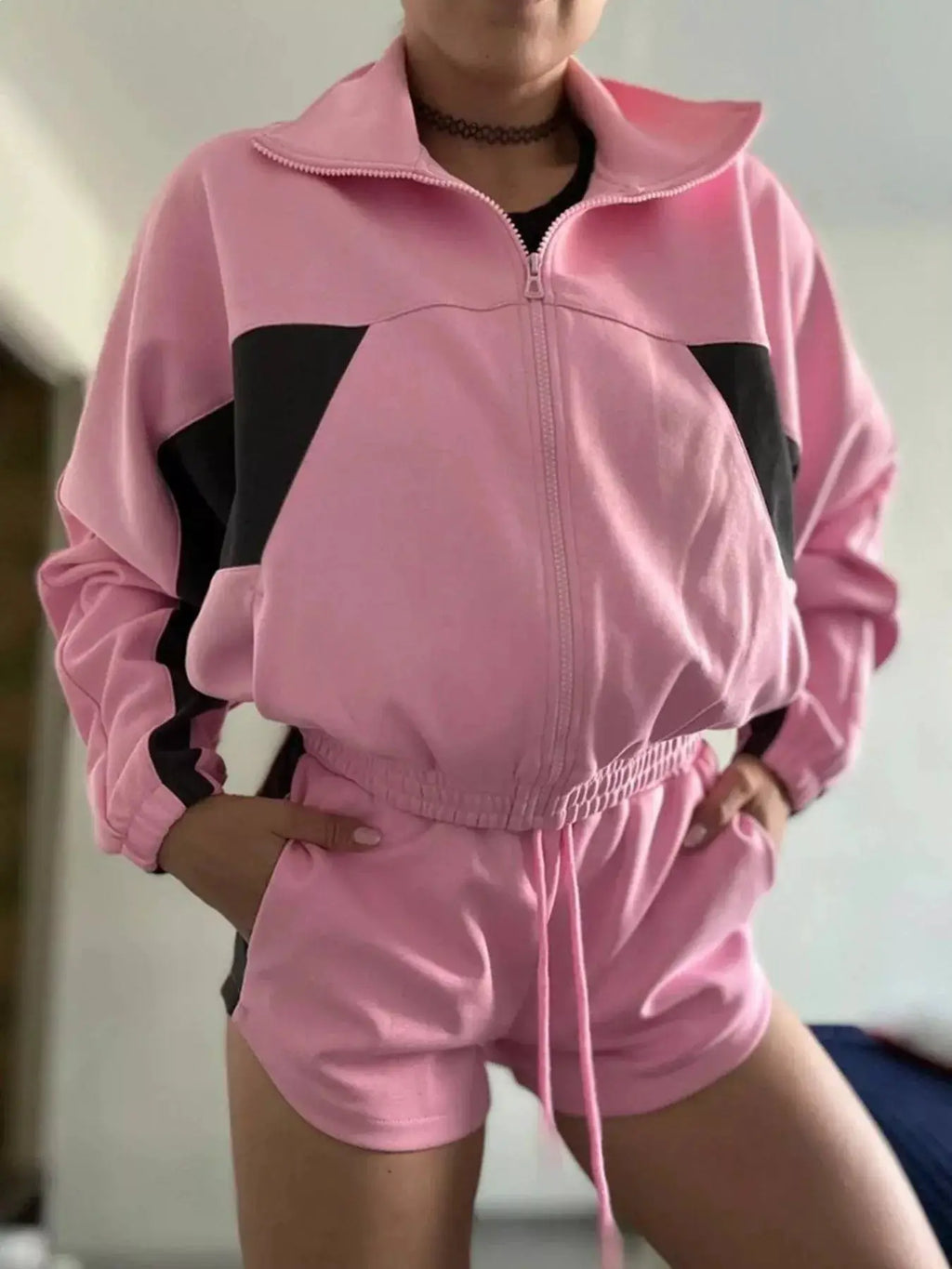 Zip-Up Long Sleeve Top & Shorts Set in pink with black color-block panels and drawstring waistband.