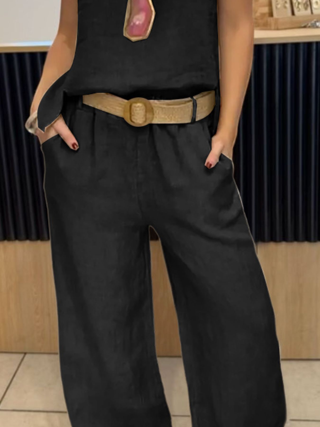 Full-size black round-neck tank and pants set, plus size, with tan belt.