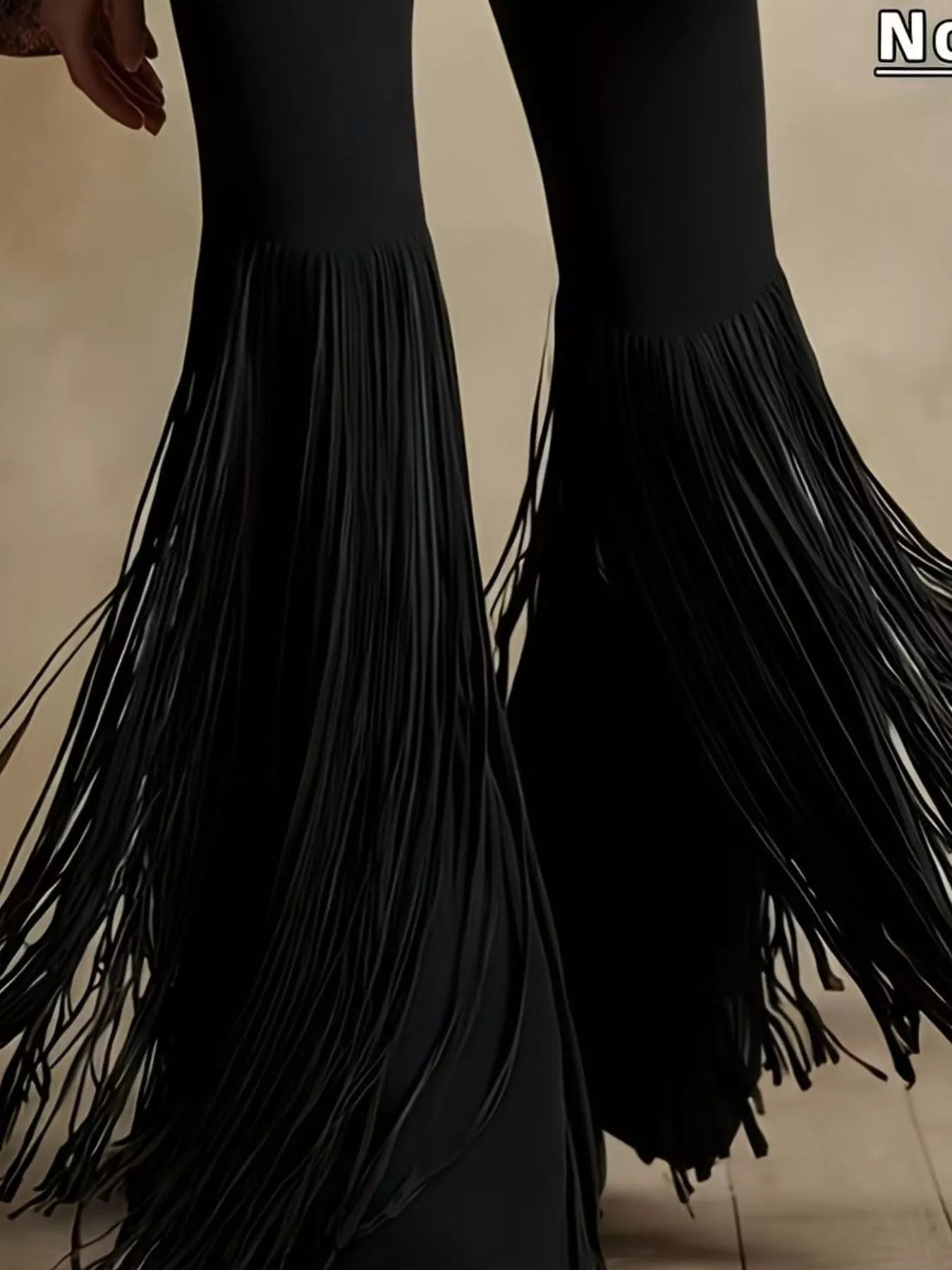 Fringe Flare Pants in black with long tassel fringe along the hems