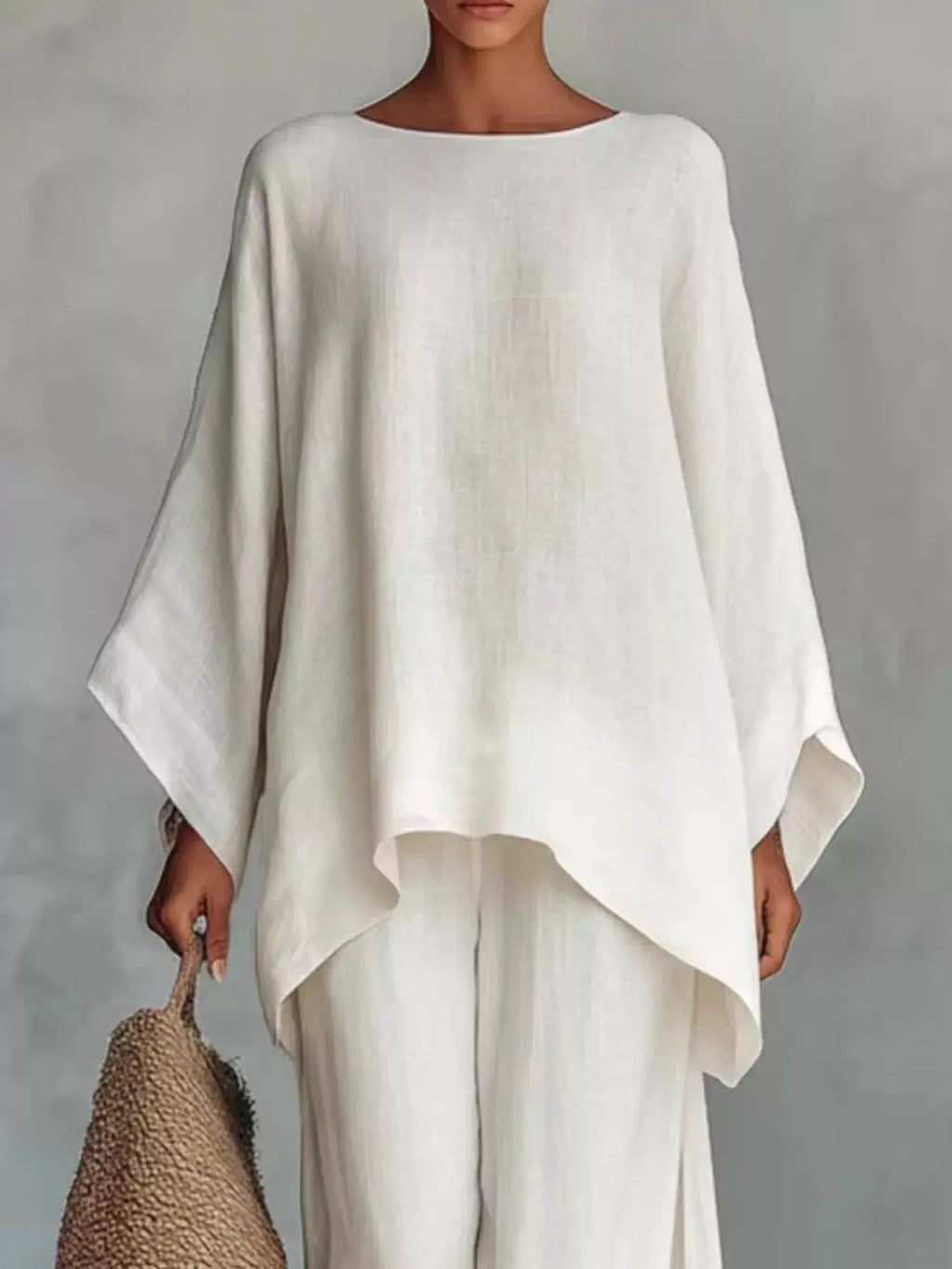 Plus Size two-piece Round-Neck top and wide-leg pants set in ivory linen-look fabric; loose, flowing fit