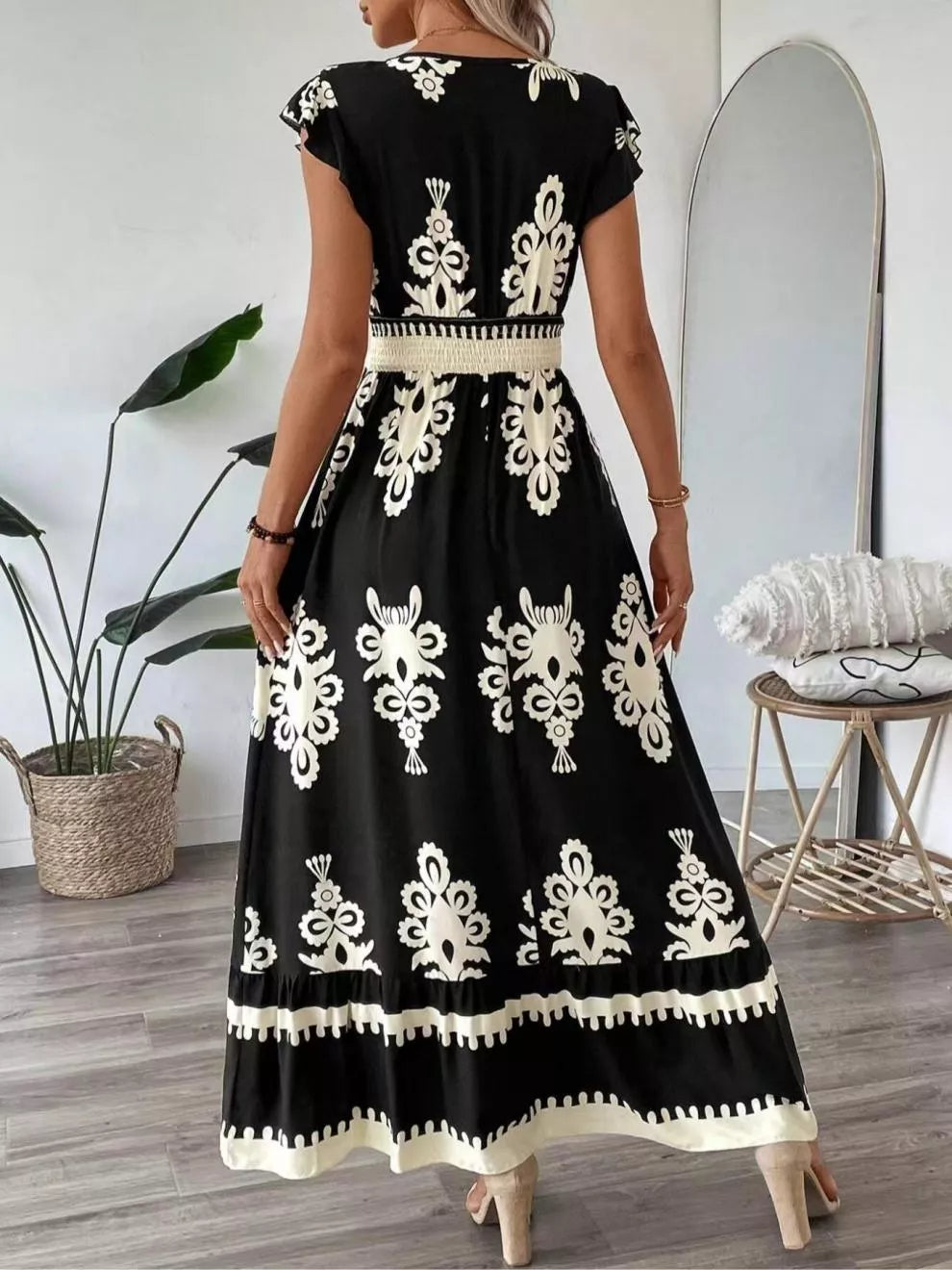 Printed V-Neck Ruffled Cap Sleeve Dress by Belle Bijouix, black with ivory floral print, smocked waist