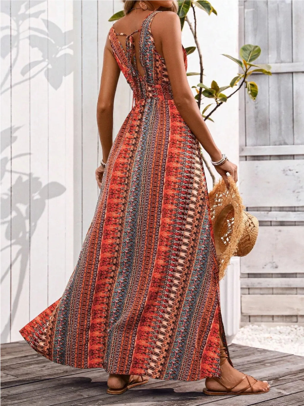 Dress Bellebijouix tied-back printed sleeveless maxi with slit in red-orange pattern