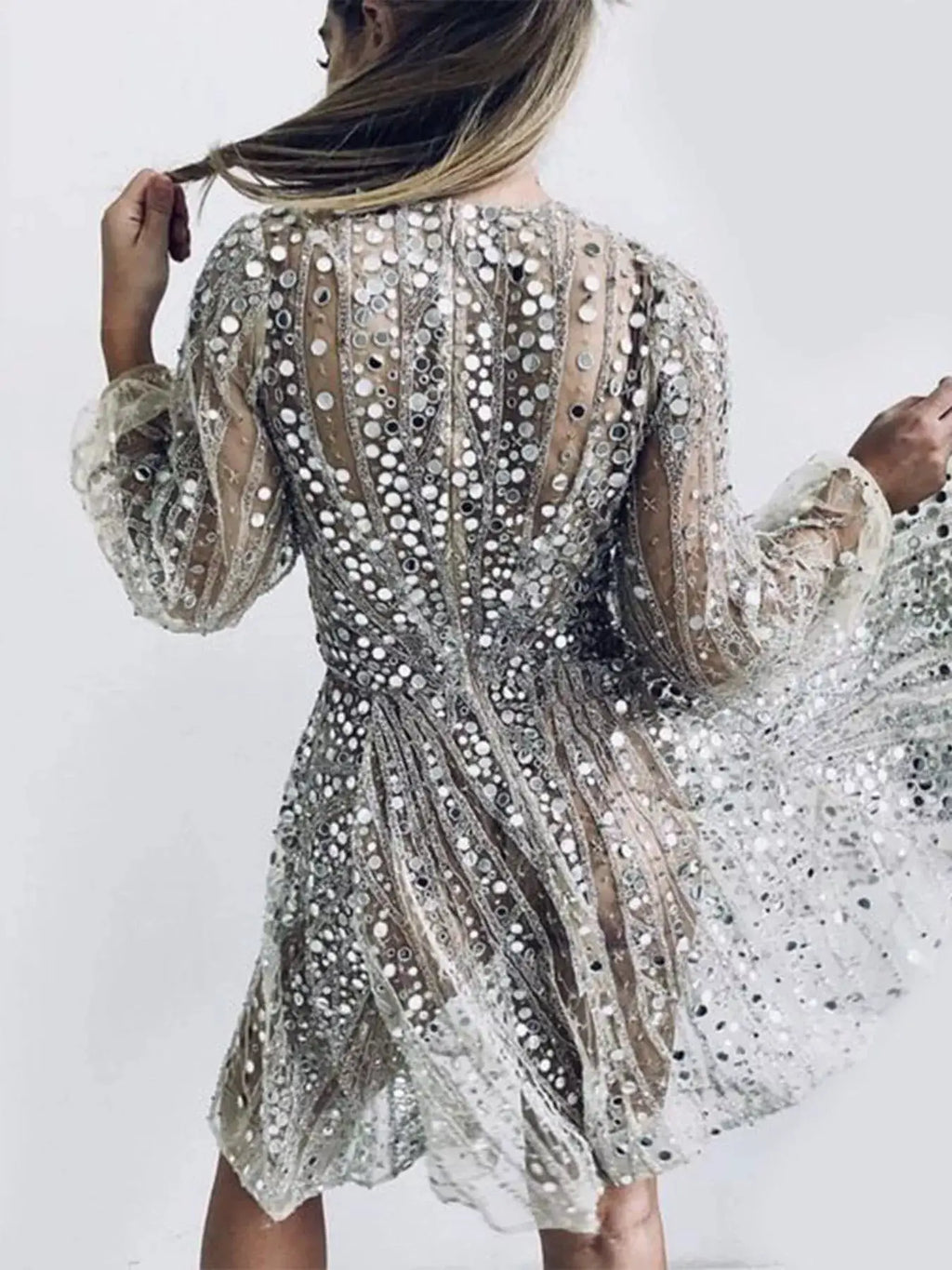 DRESSES: Silver-tone sequin mini dress with sheer long puff sleeves and all-over metallic sparkle with sequins.