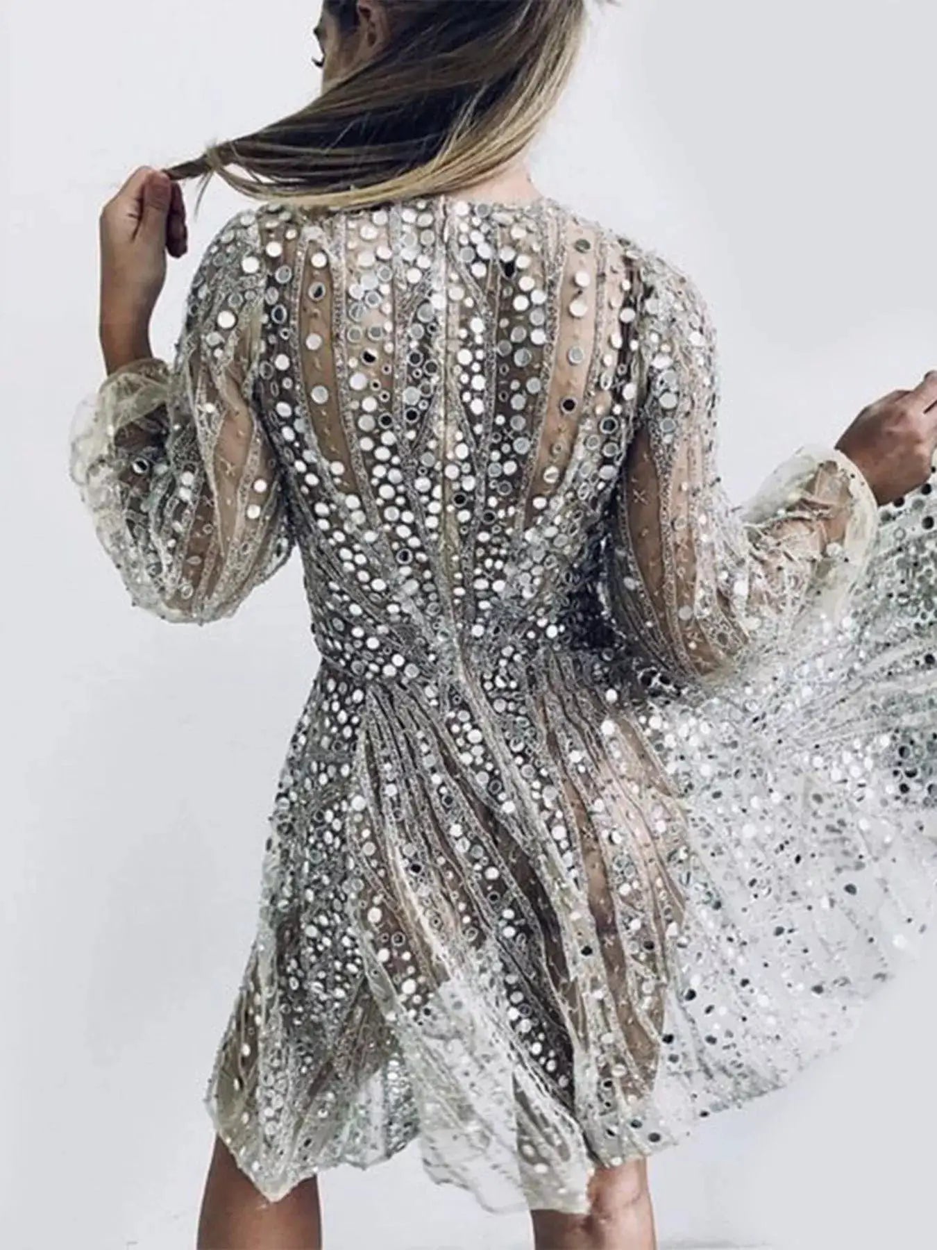 DRESSES: Silver-tone sequin mini dress with sheer long puff sleeves and all-over metallic sparkle with sequins.