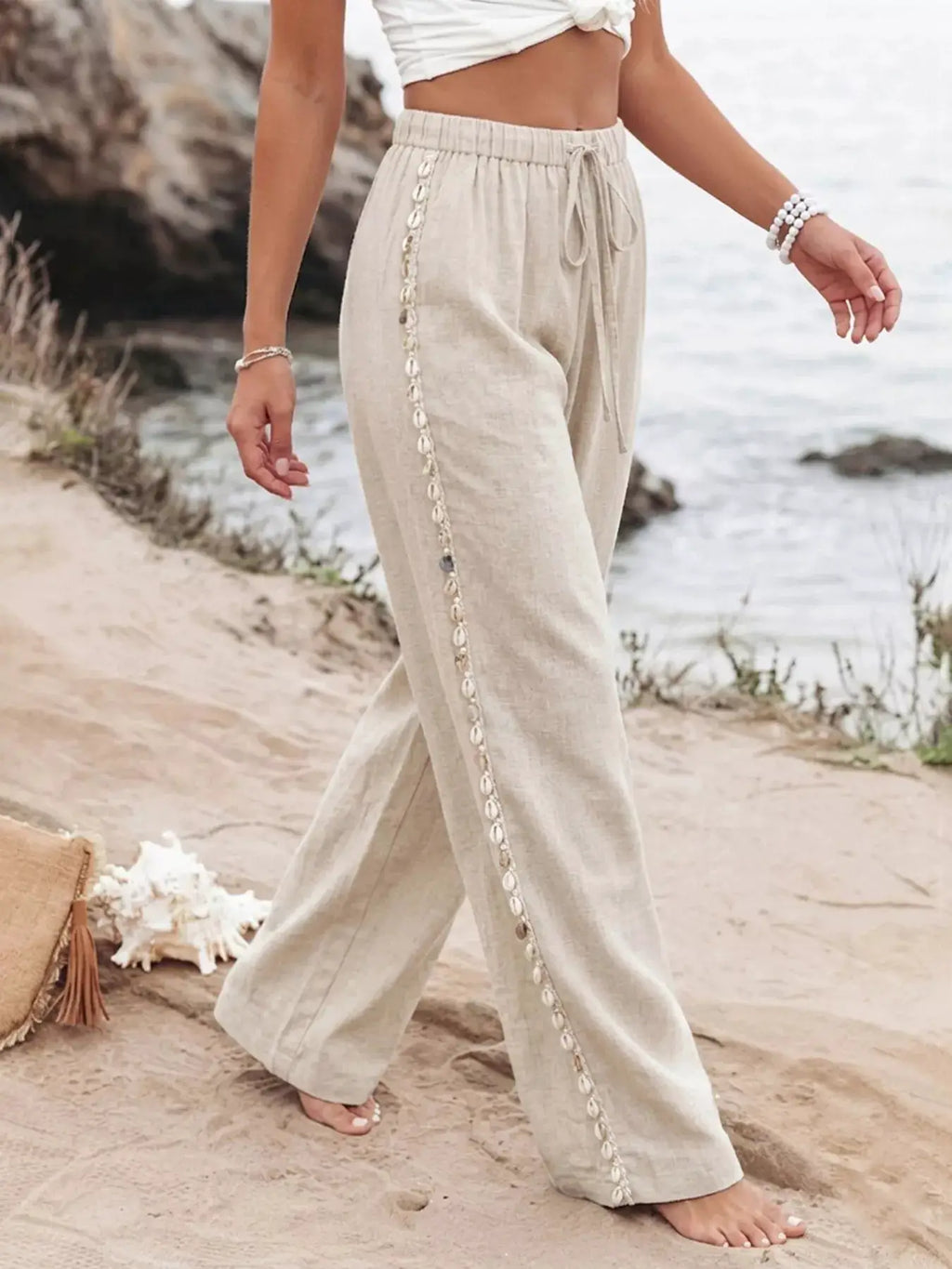 Drawstring Wide Leg Pants in beige linen-look fabric with shell trim along the side seam