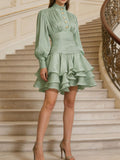 Ruffled Layered Lantern Sleeve Mini Dress in mint green with buttoned ruched bodice and tiered skirt by Belle Bijouix.