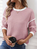Belle Bijouix pink contrast-trim knit drop-shoulder sweater, loose fit with white cuffs.