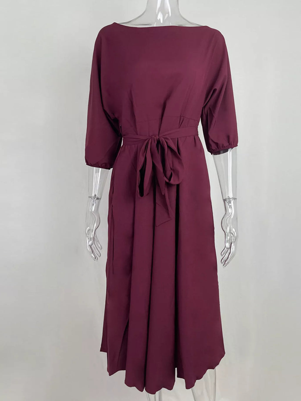 Boat Neck Tie Waist Dress in burgundy by Trendsi, back waist bow, 3/4 sleeves.