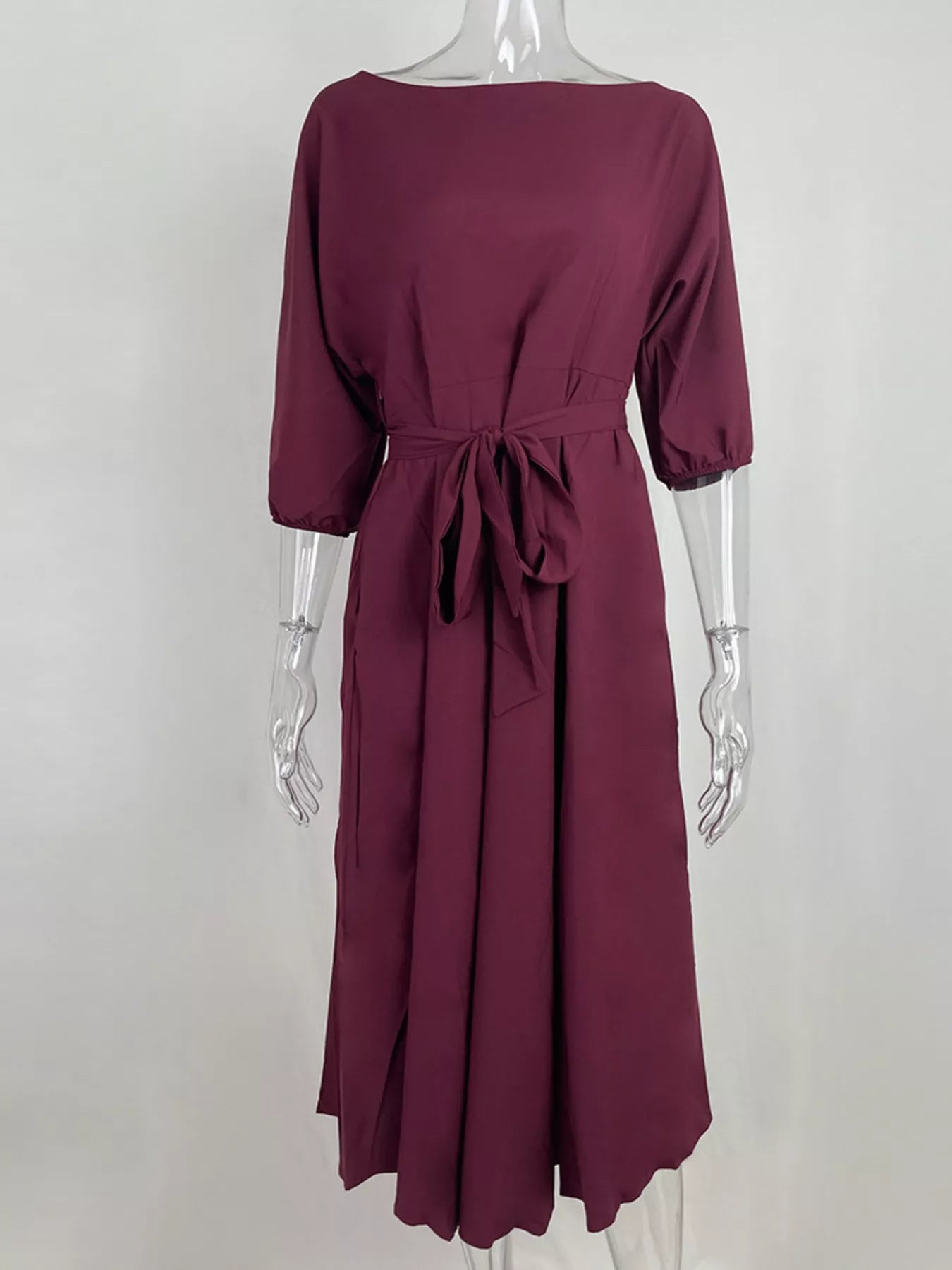 Boat Neck Tie Waist Dress in burgundy by Trendsi, back waist bow, 3/4 sleeves.
