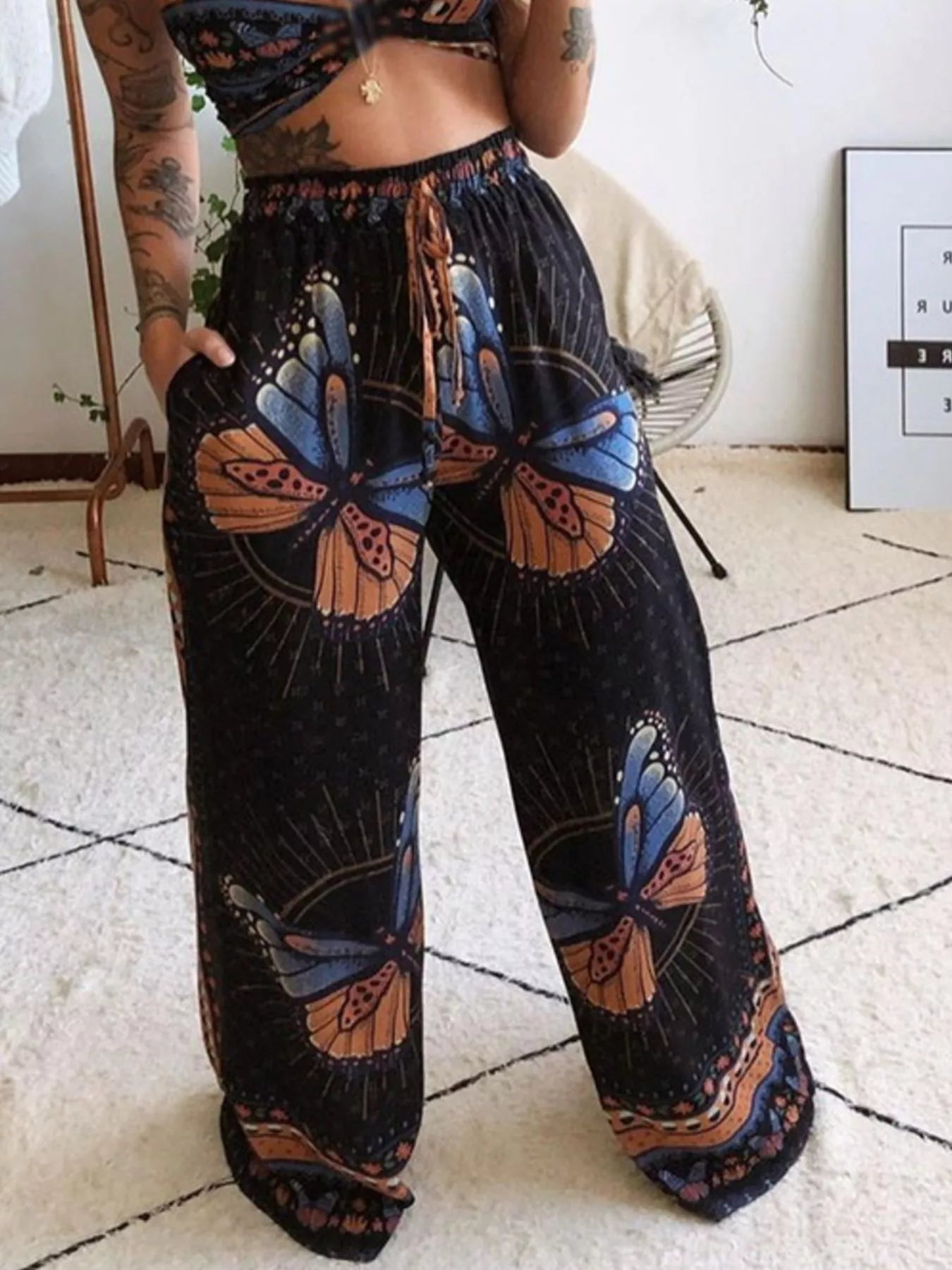 Boho Butterfly Print Top and Pants Set, black fabric with orange-blue butterfly prints, Trendsi