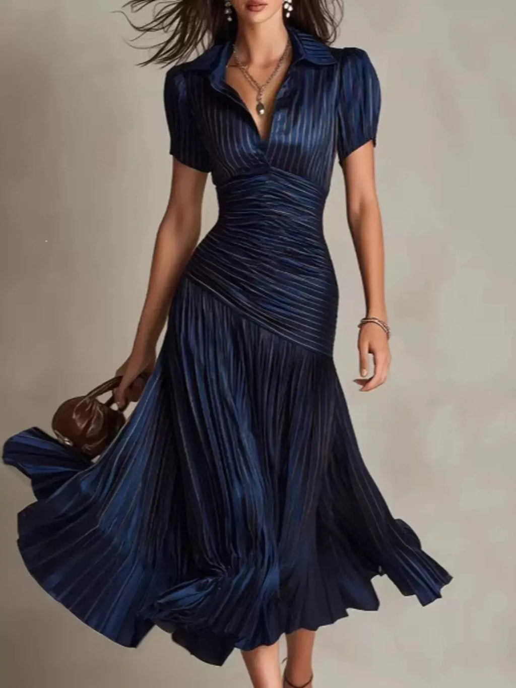 Pleated striped navy short-sleeve midi dress with ruched waist by Belle Bijouix