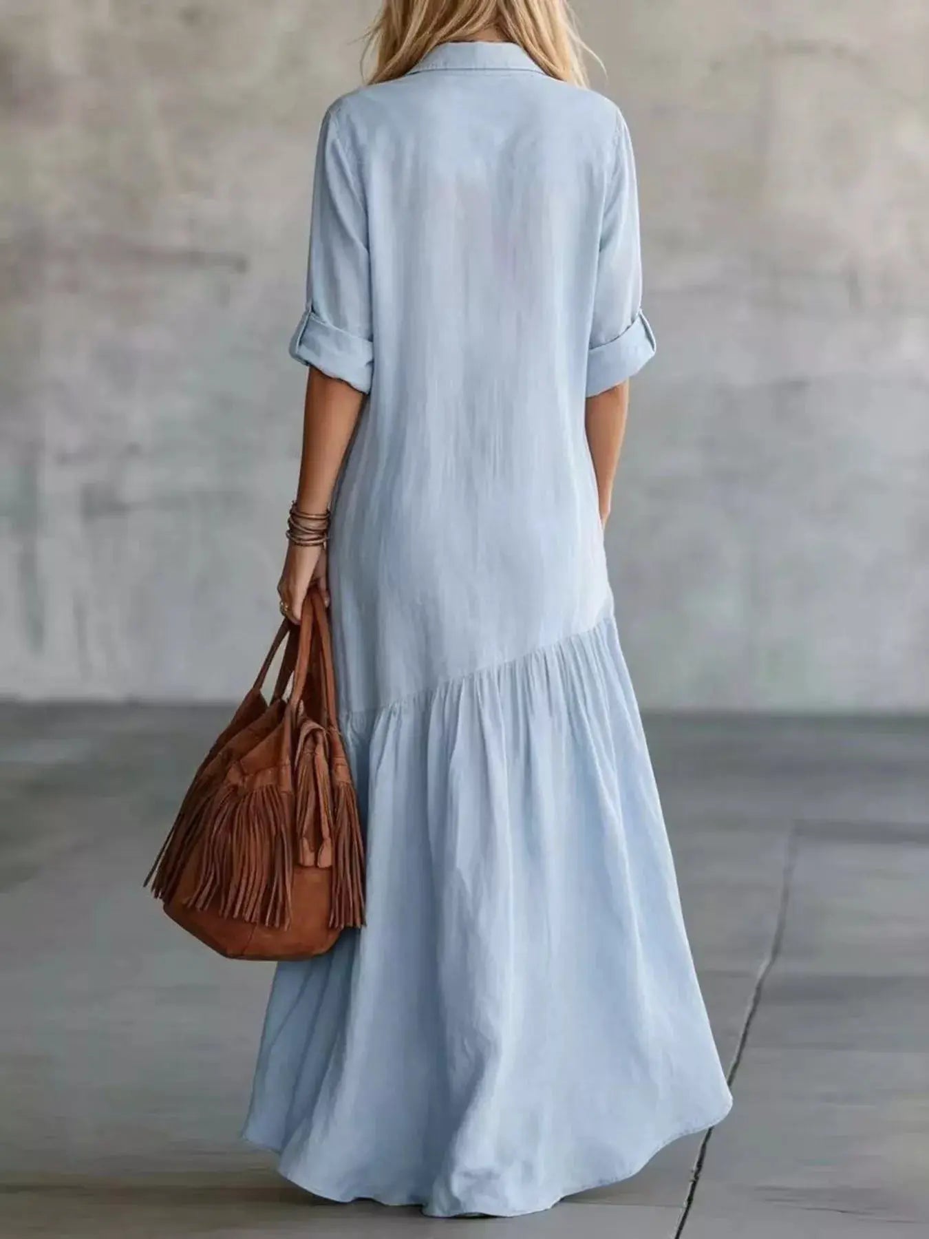 Plus Size Maxi Dress in light blue with roll-up sleeves and a flowing tiered hem (back view)