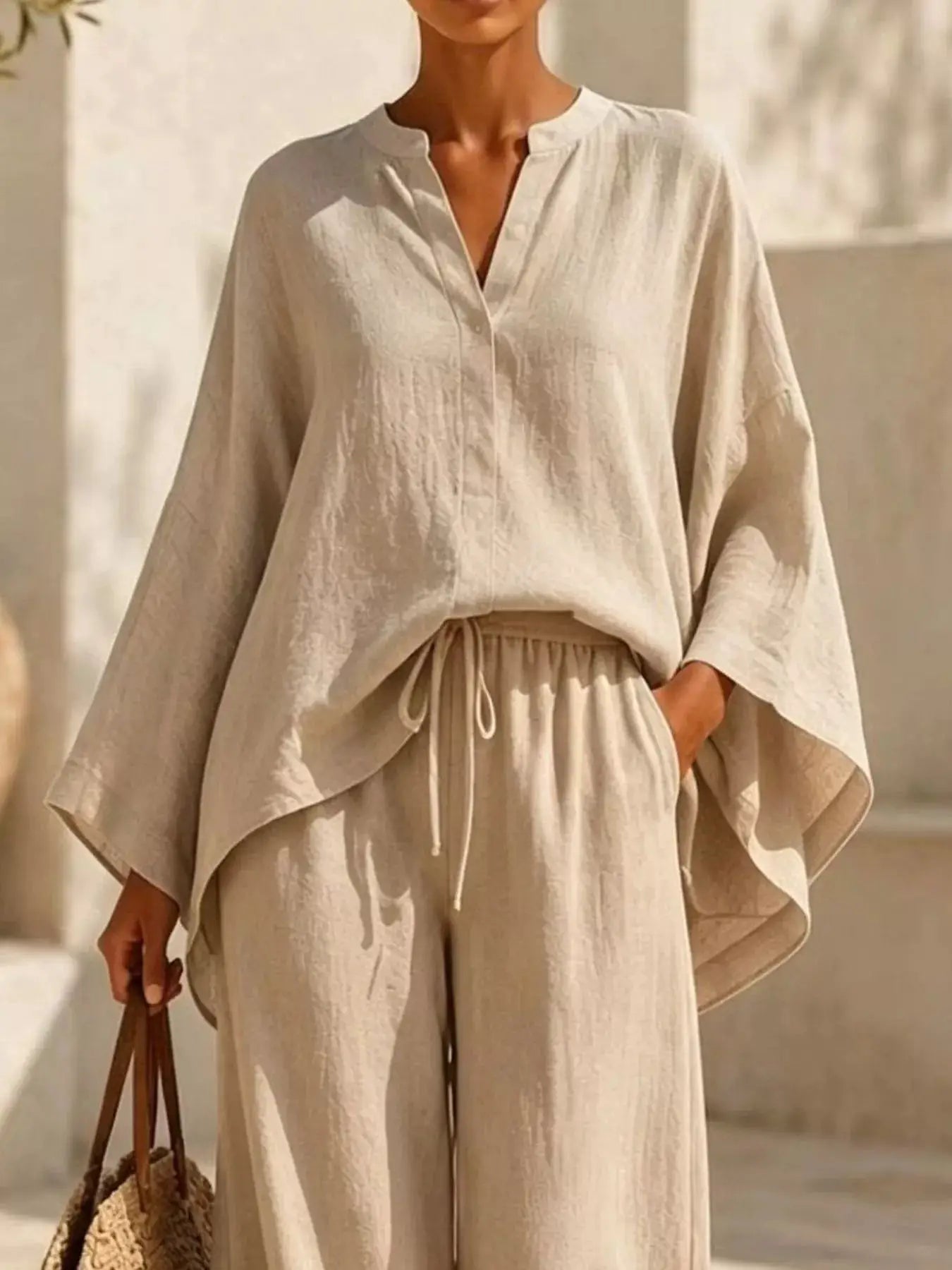Plus size notched long-sleeve top and wide-leg pants set in beige linen, Belle Bijouix
