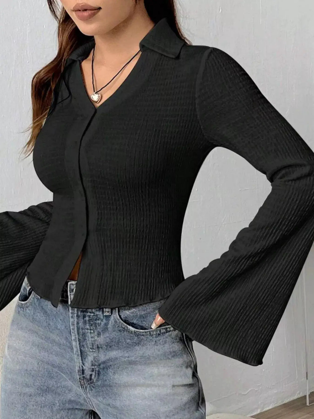 Button Up Flare Sleeve Shirt by Trendsi, black ribbed knit top with collar and bell sleeves.