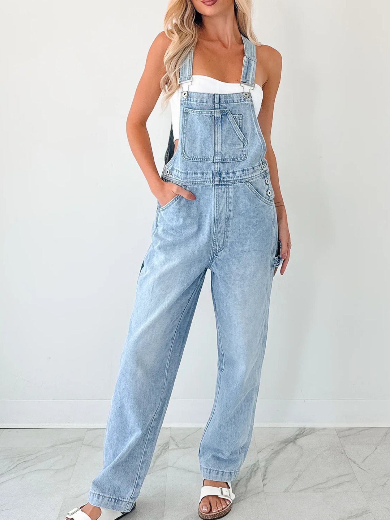 Wide-strap relaxed-fit denim overalls in light wash with front pocket by Trendsi