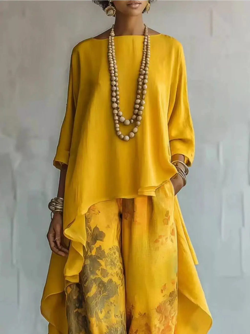 Outfit set by Belle Bijouix: asymmetrical-hem yellow top with floral pants