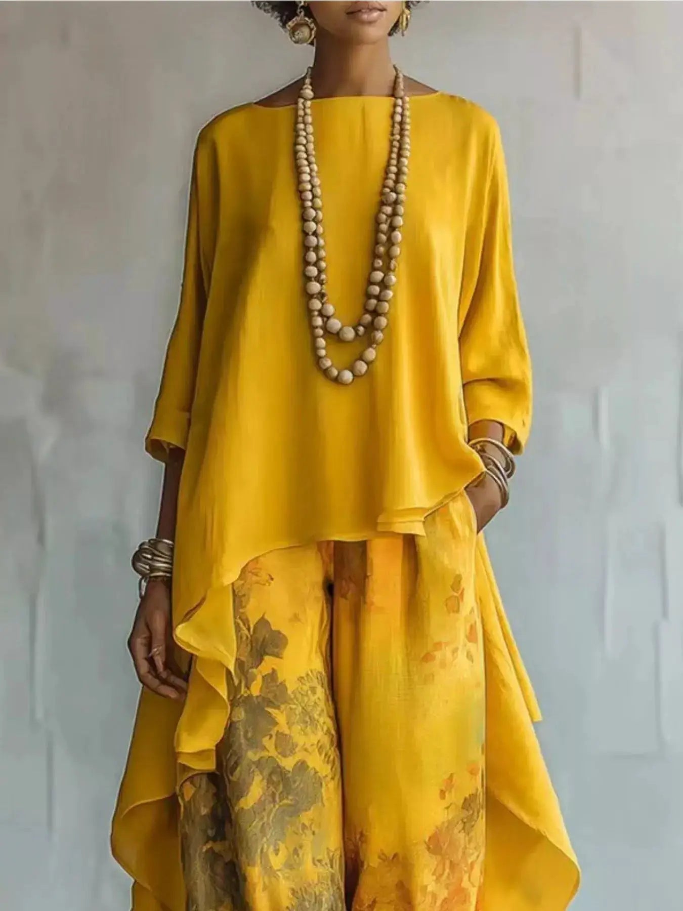 Outfit set by Belle Bijouix: asymmetrical-hem yellow top with floral pants