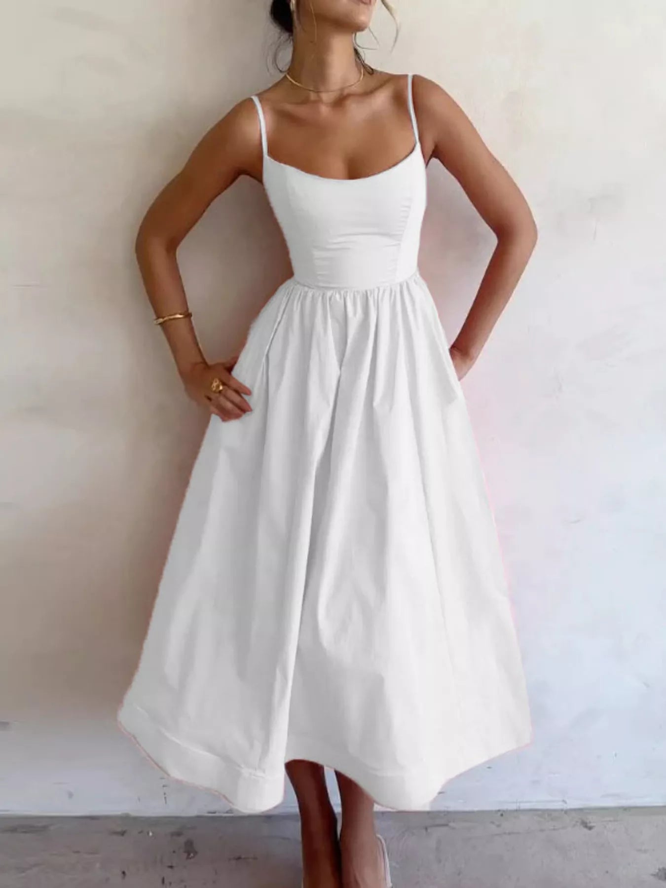 Adjustable-strap scoop-neck white midi dress with fitted bodice and flowing A-line skirt by Trendsi.