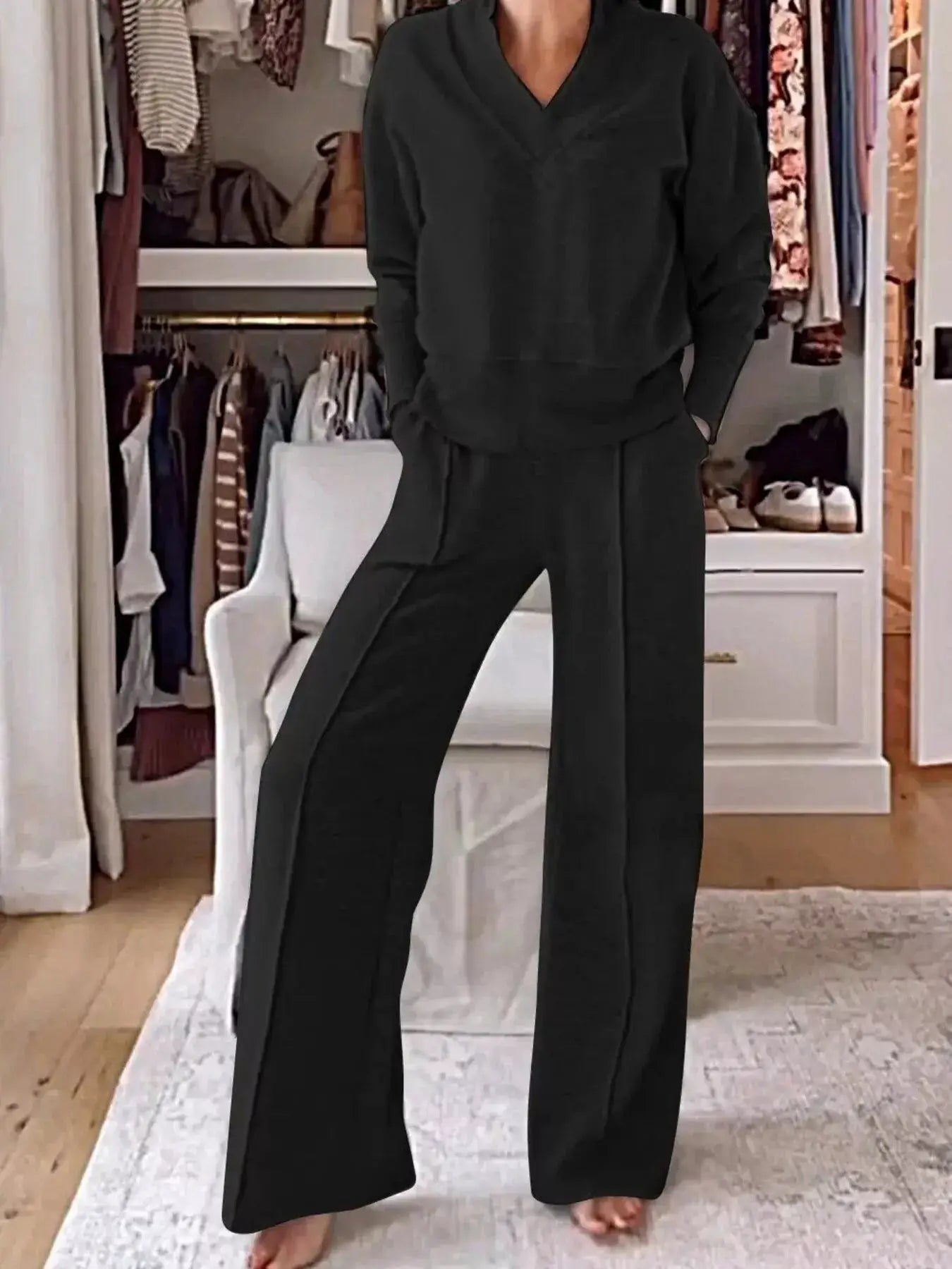 Plus-size cozy V-neck top and pants set in black with pockets, loungewear