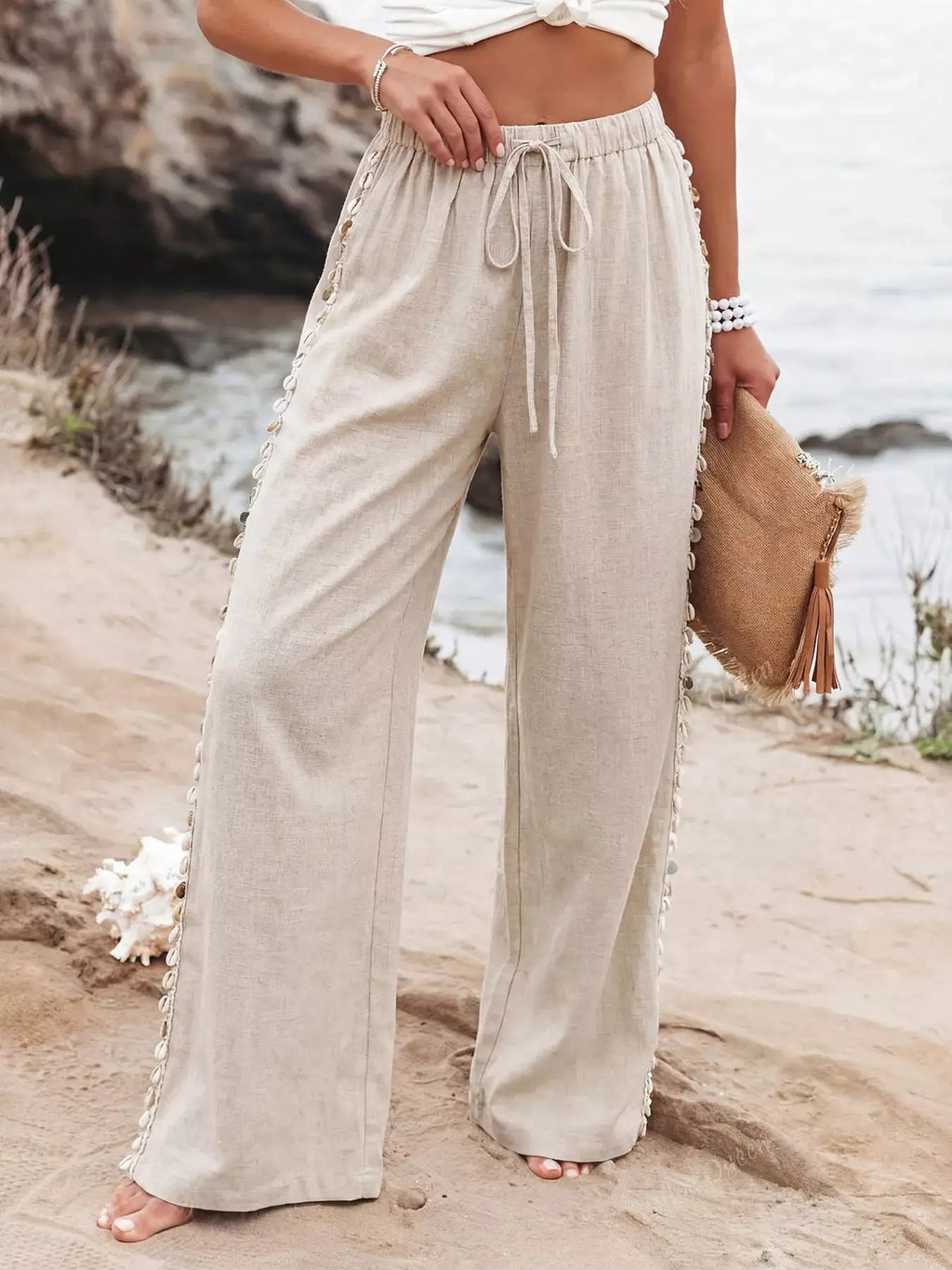 Drawstring wide-leg linen pants in beige with side shell bead trim