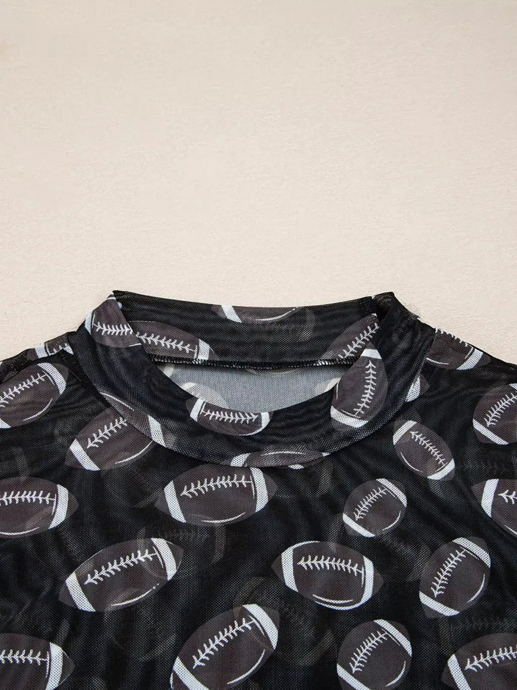 Game Day Mesh Sheer Long Sleeve Top in black with football print
