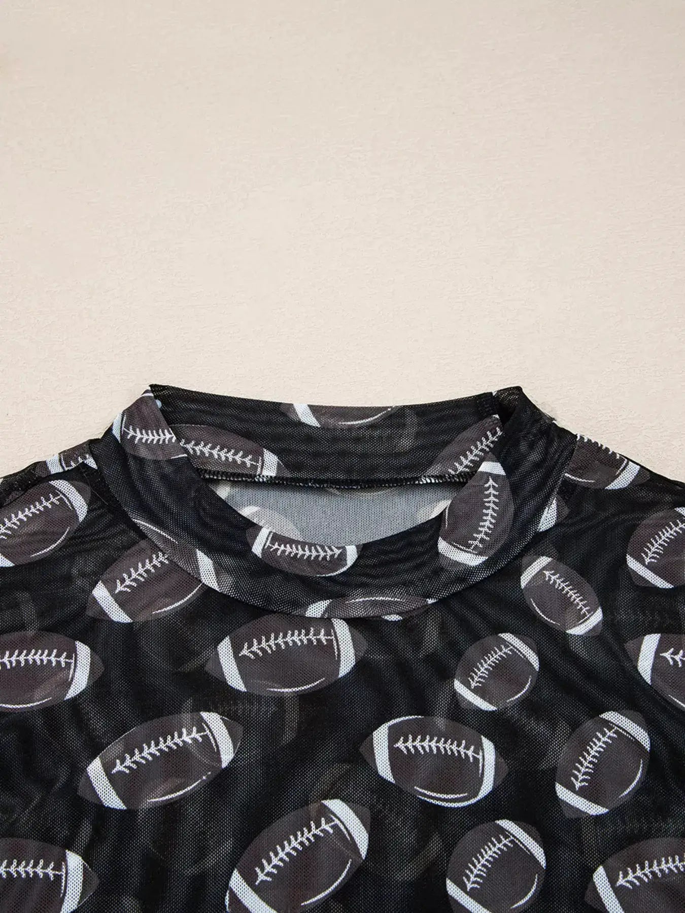 Game Day Mesh Sheer Long Sleeve Top in black with football print