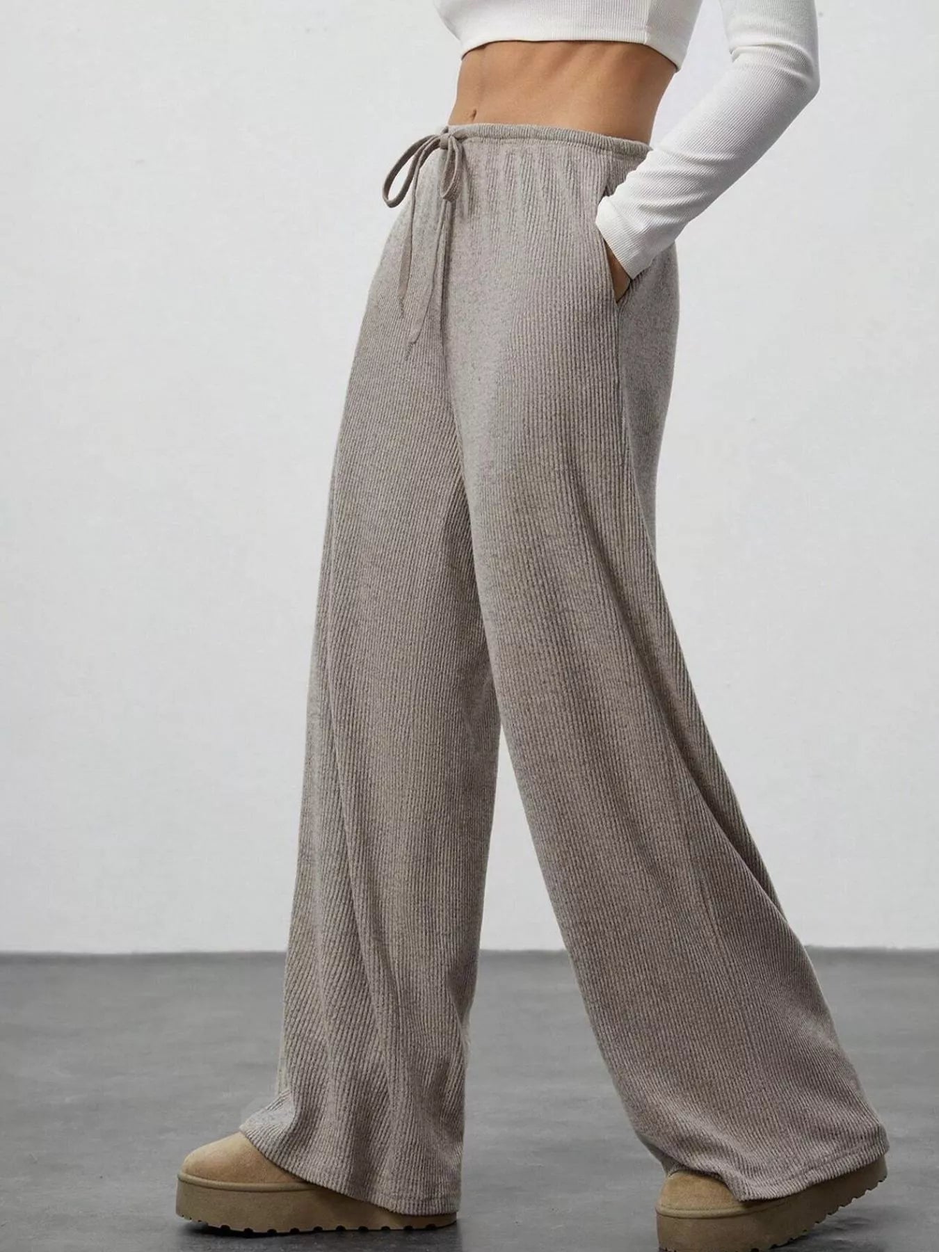 Relaxed fit drawstring jogger pants in taupe ribbed fabric with pockets