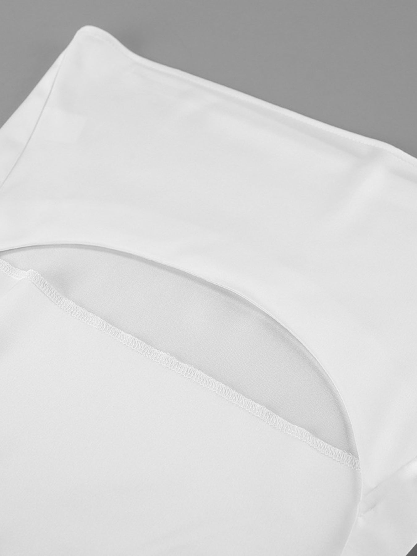 Halter Neck Satin Cami in white satin fabric, close-up seam detail