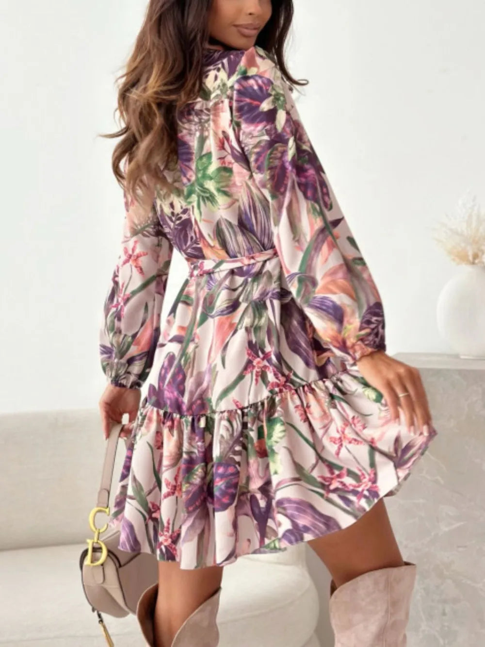 Ruffle Hem Floral Long Sleeve Dress Belle Bijouix, pink botanical print with purple/green accents; belted waist.