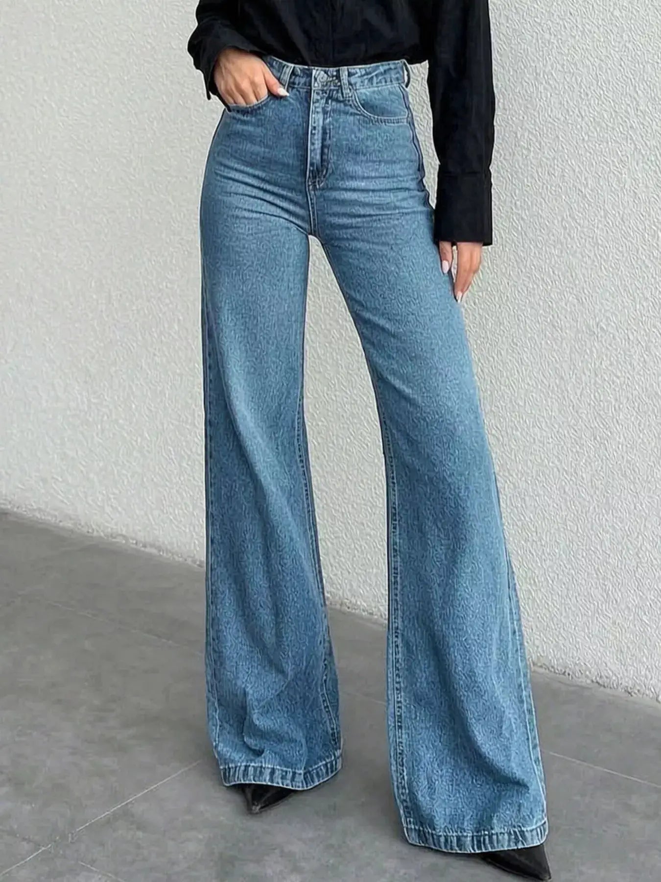 High-Waisted Bootcut Jeans in blue denim by Trendsi, full-length women's jeans with classic five-pocket styling.