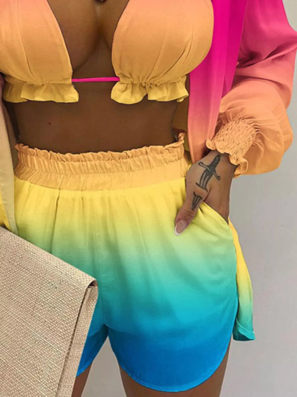 3-piece plus-size outfit set: halter-neck yellow cami, sheer pink shirt, and rainbow gradient shorts