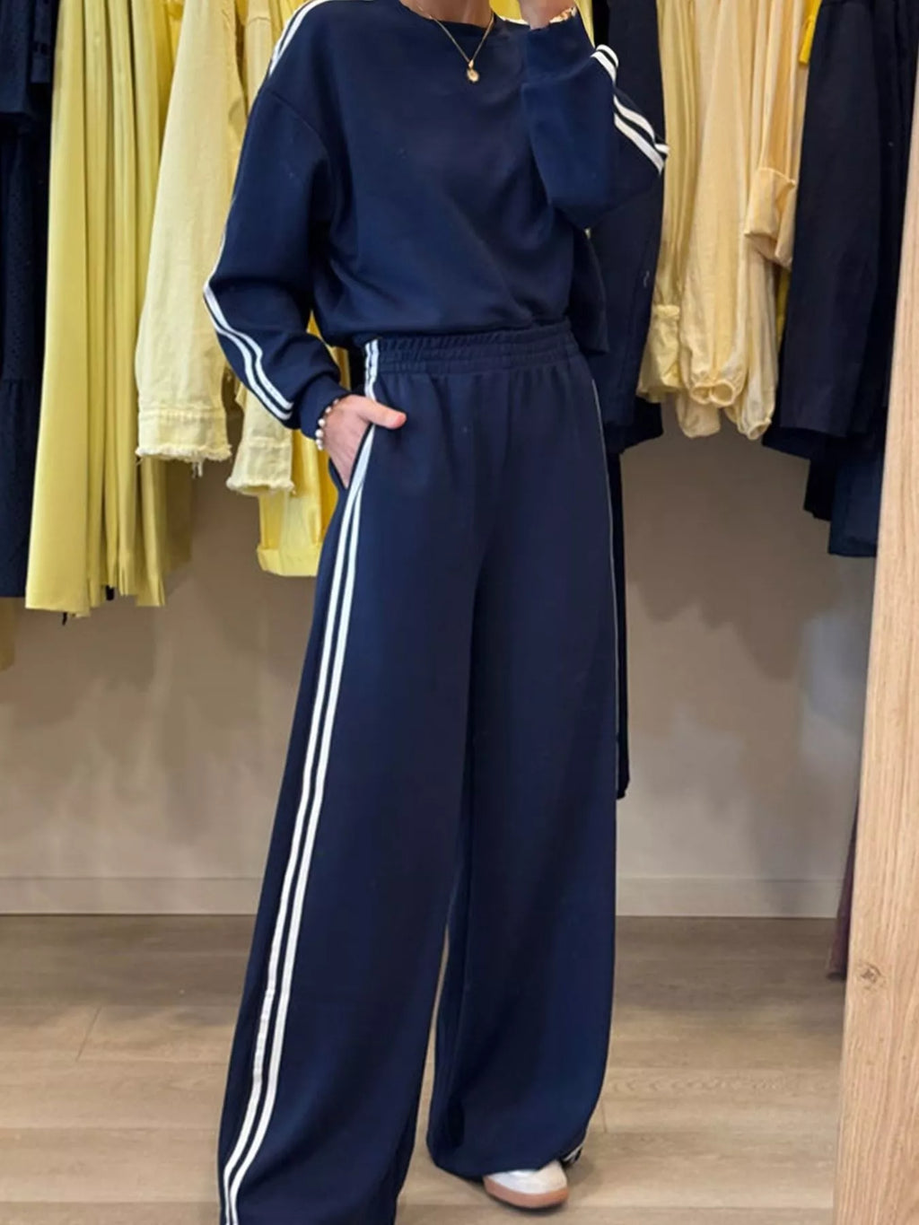 2-piece Belle Bijouix navy activewear set: striped crewneck top and elastic-waist pants