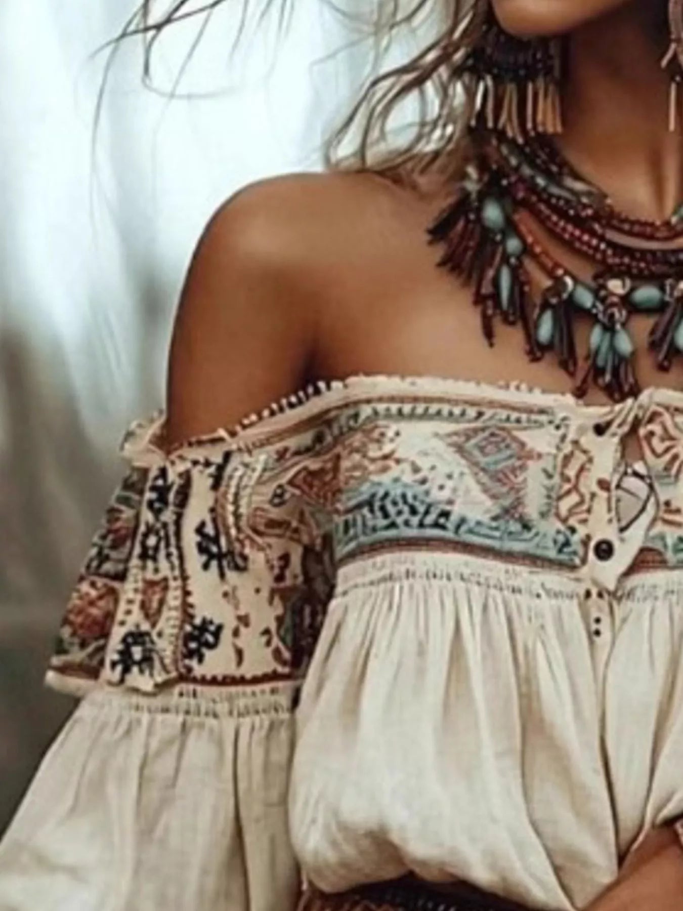 Off-shoulder boho blouse in cream with colorful tribal print