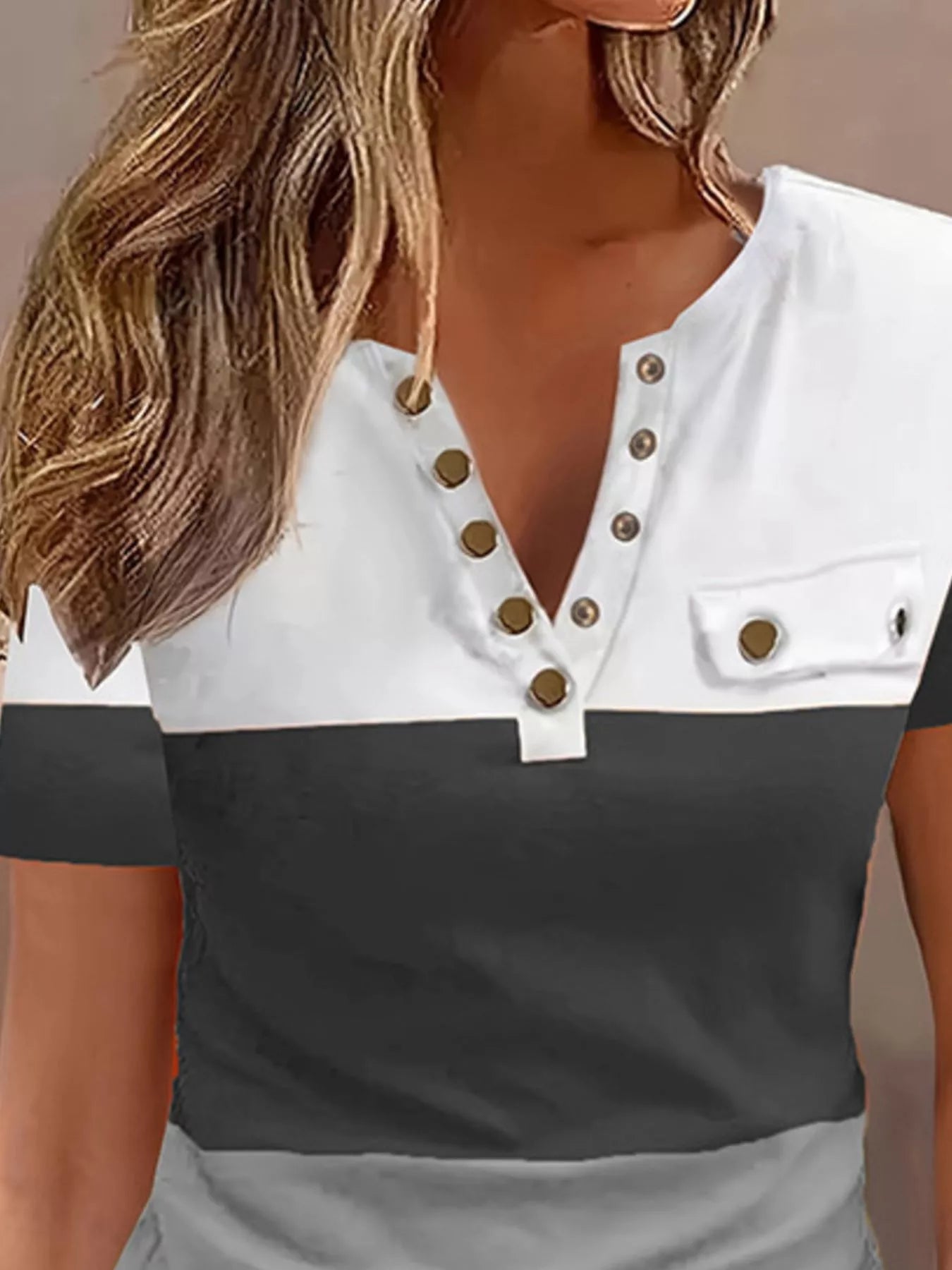 Color Block Short Sleeve Casual T-Shirt by Trendsi, white top with gold snap placket and pocket, black midsection.