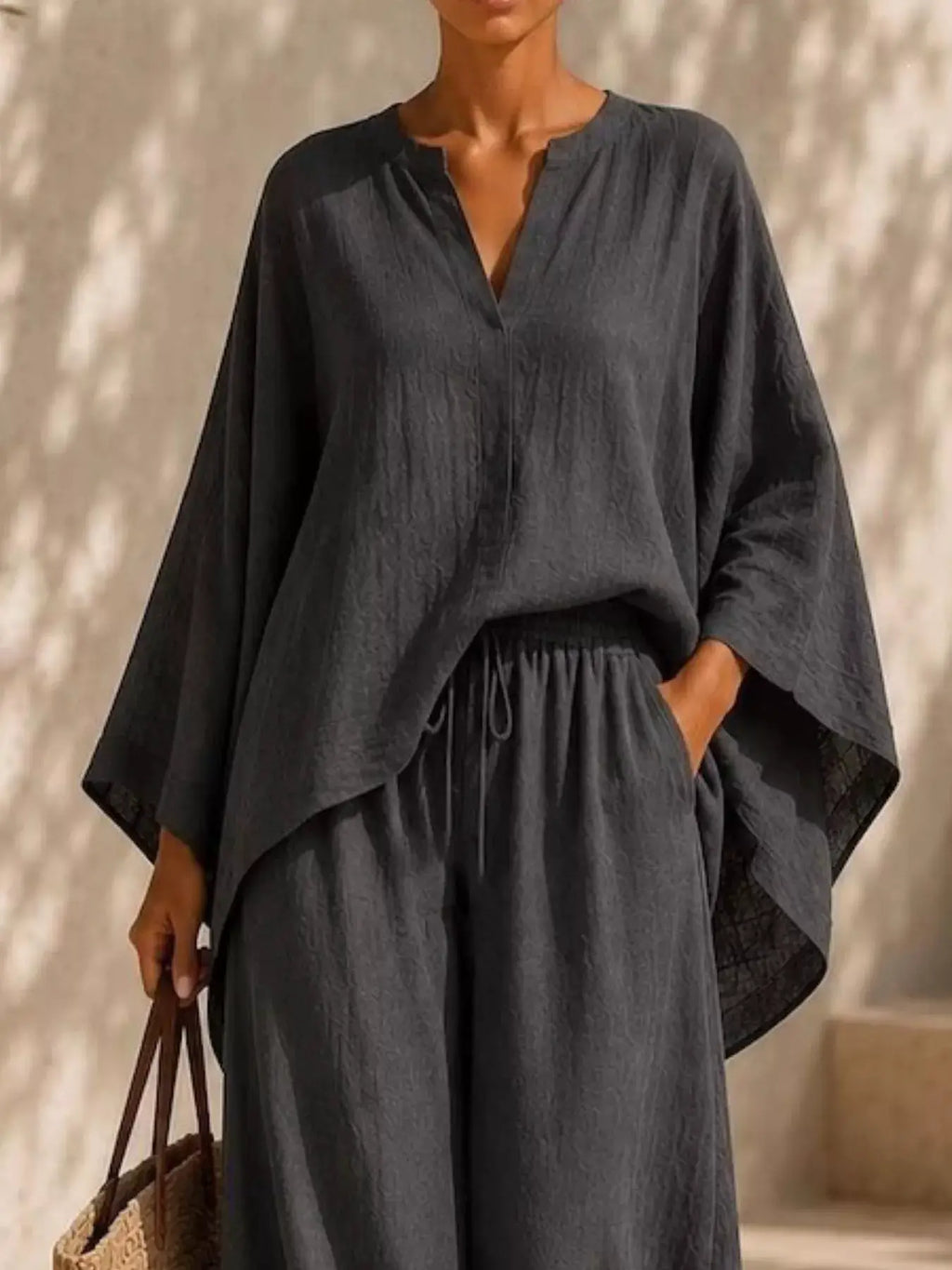 Plus Size Notched Long Sleeve Top & Wide Leg Pants Set in charcoal gray by Belle Bijouix