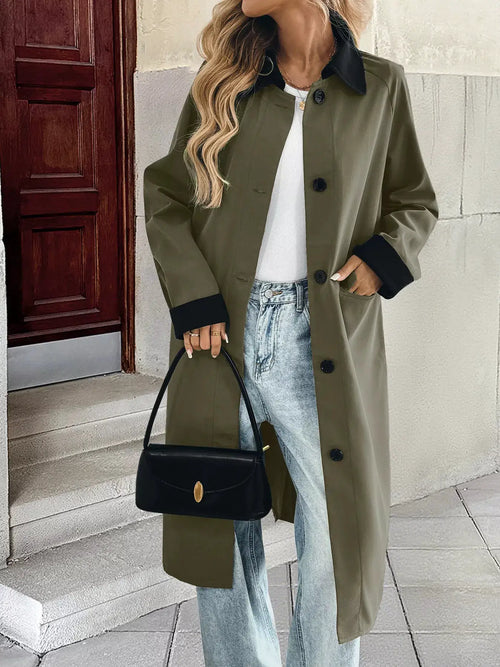 Contrast Collar Button Up Coat in olive with black cuffs and collar, buttoned front and pockets, with a black handbag