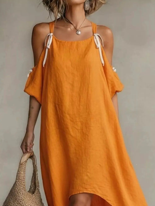 High-Low Cold Shoulder Maxi Dress in orange with white tie straps.