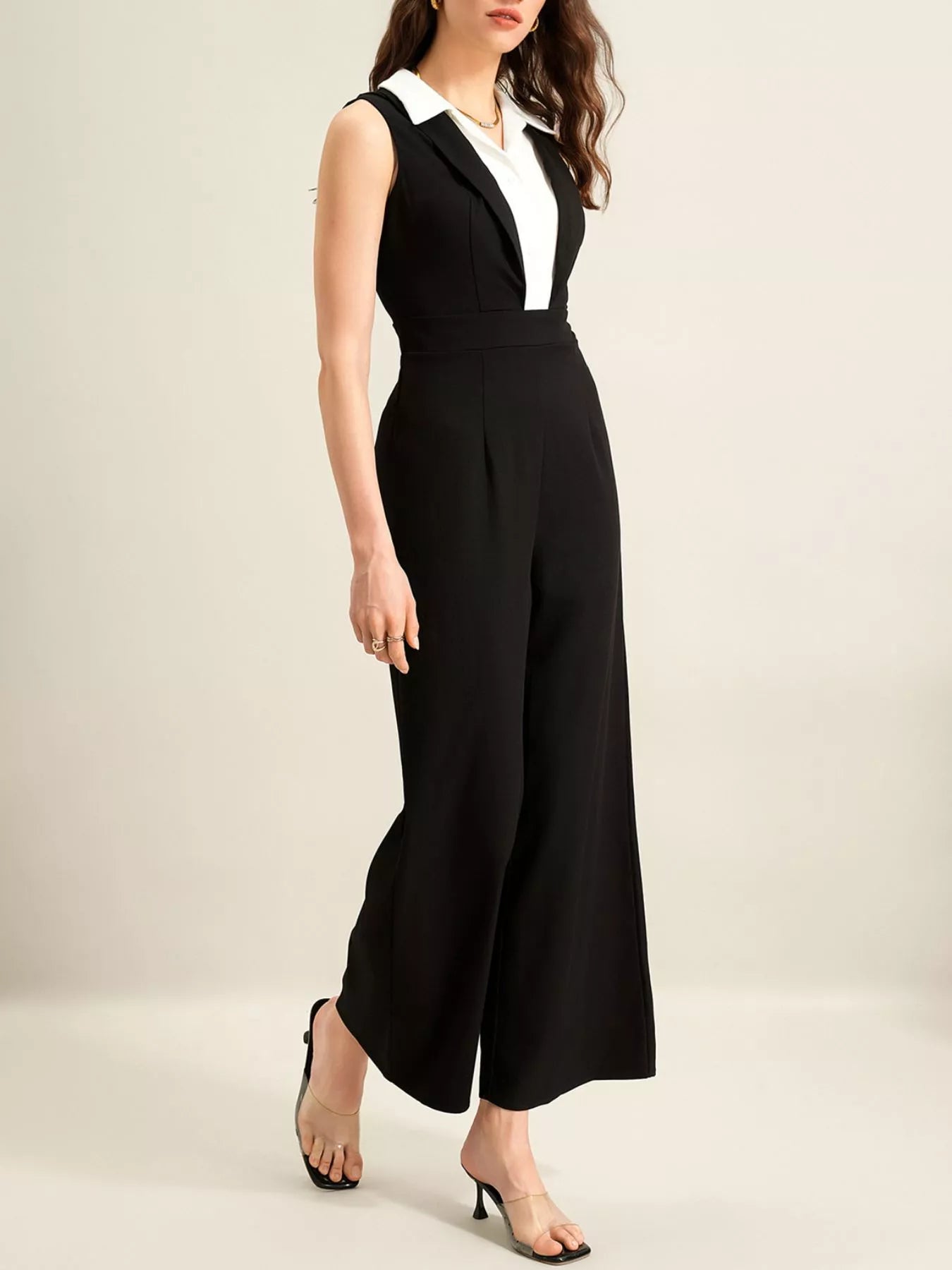 Sleeveless wide-leg jumpsuit by Trendsi in black with white collar detail.