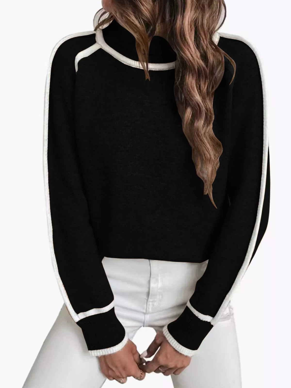 Front view of black turtleneck sweater with white contrast trim