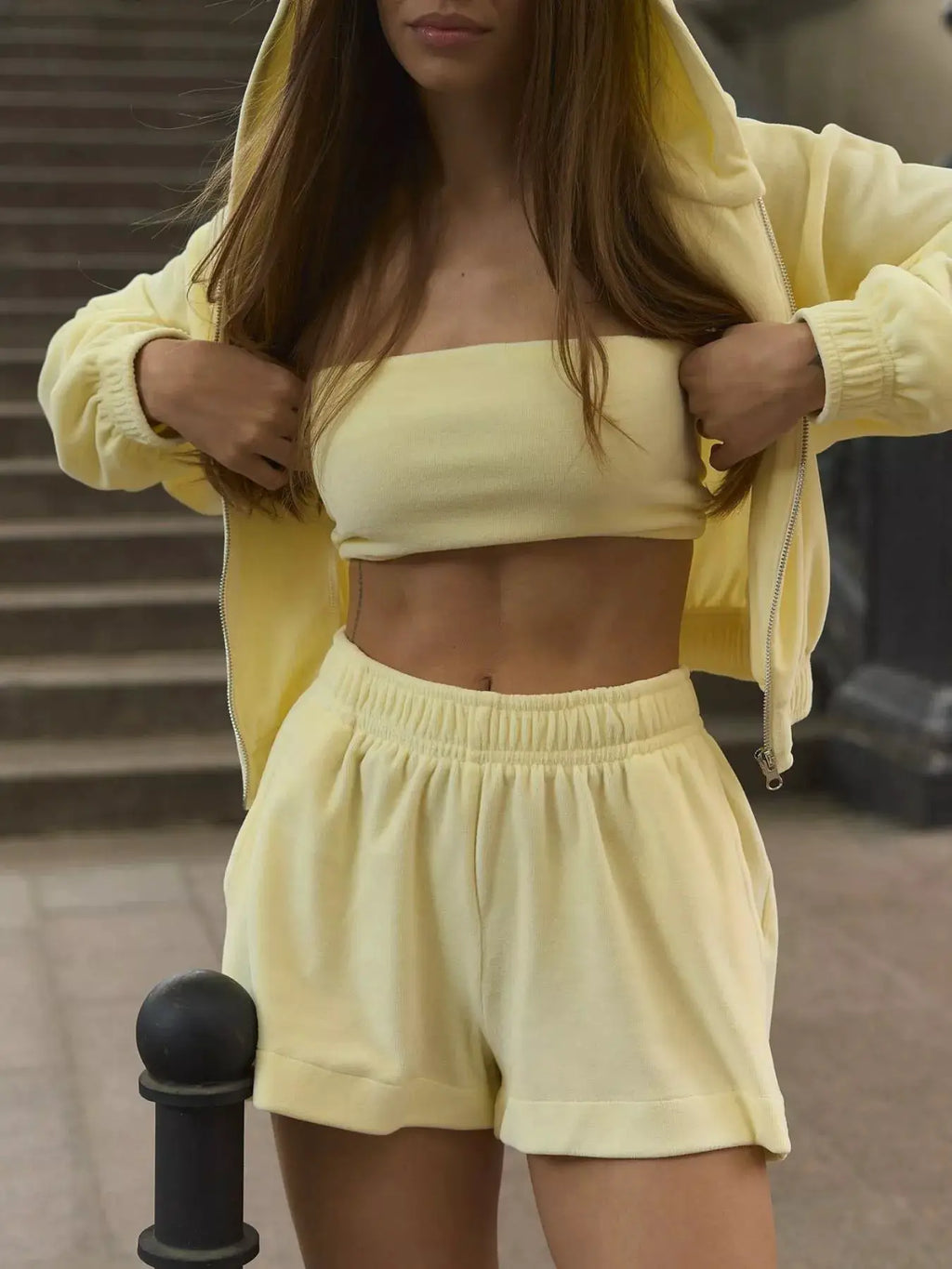 Zip-Up Cropped Hoodie & Shorts Set in pale yellow; two-piece activewear outfit.