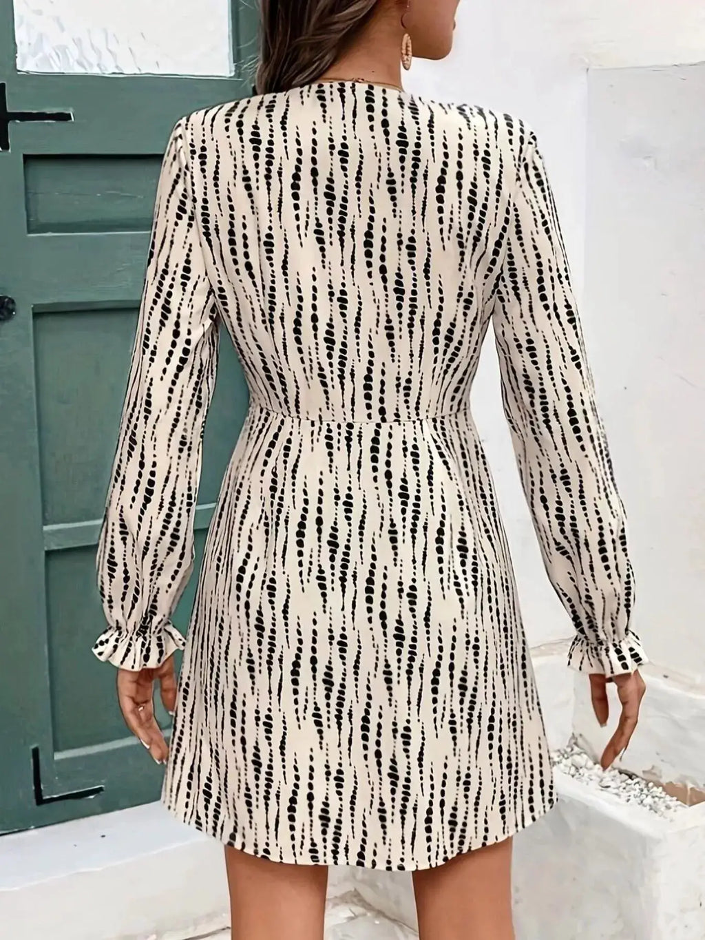 Button Front Flounce Sleeve Dress by Belle Bijouix in beige with black dotted stripes, belted