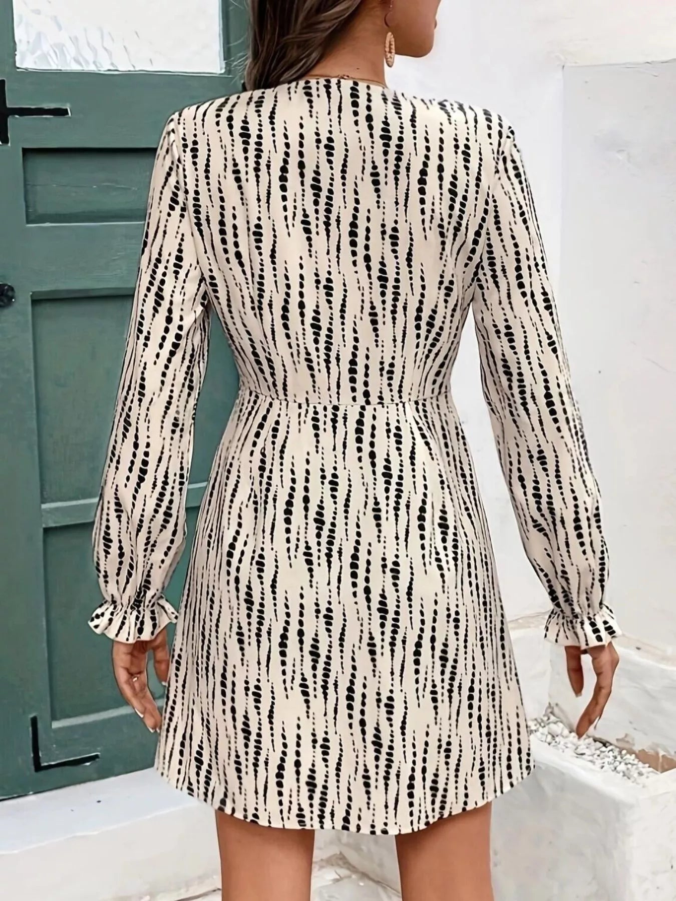 Button Front Flounce Sleeve Dress by Belle Bijouix in beige with black dotted stripes, belted