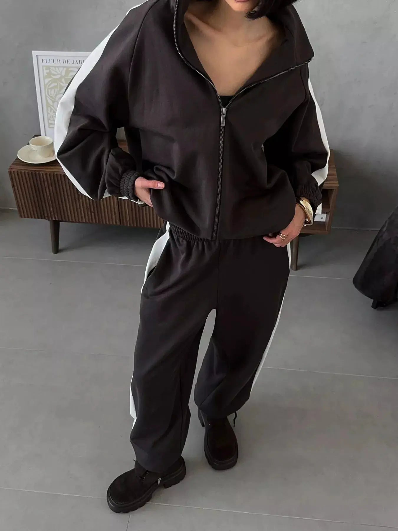 Two-Piece Zip Up Long Sleeve Outerwear and Pants Set in black with white side stripes; activewear