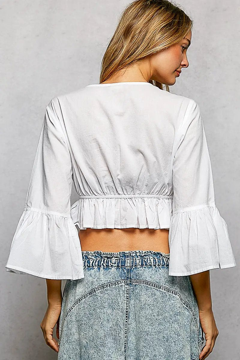 POL floral embroidered cropped blouse in white with puff sleeves and ruffled hem
