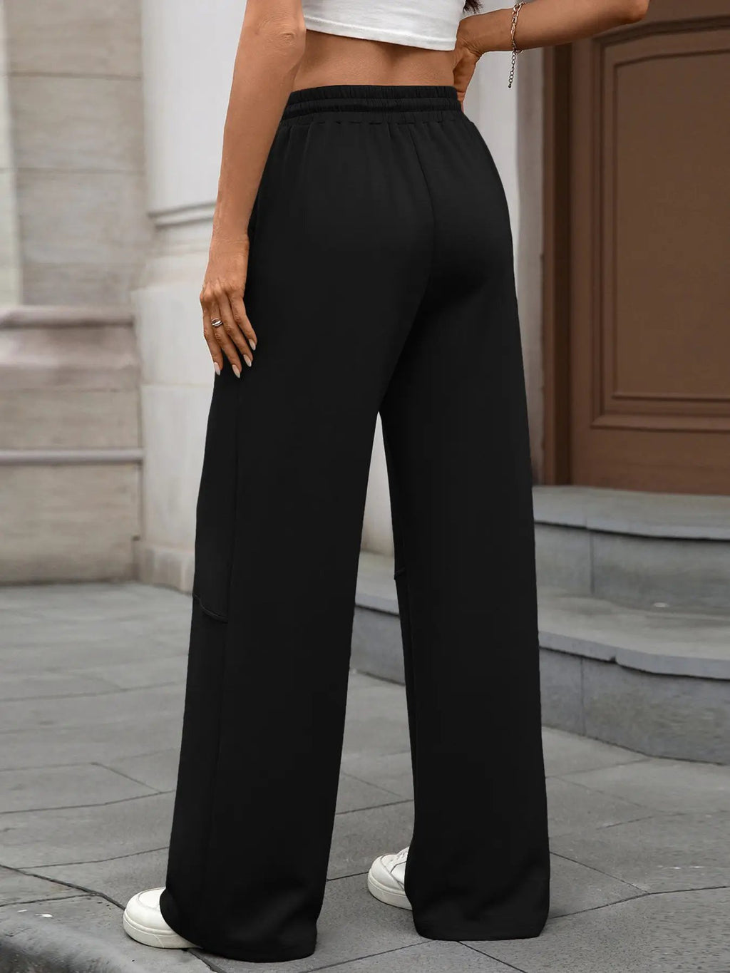 Drawstring high-waist wide-leg black pants with a relaxed casual fit