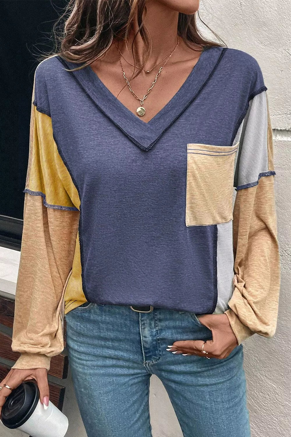 Color Block V-Neck Long Sleeve T-Shirt; blue body with tan patchwork sleeves and front pocket.
