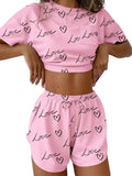 Printed Round Neck Tee and Shorts Set in pink by Trendsi with Love heart print