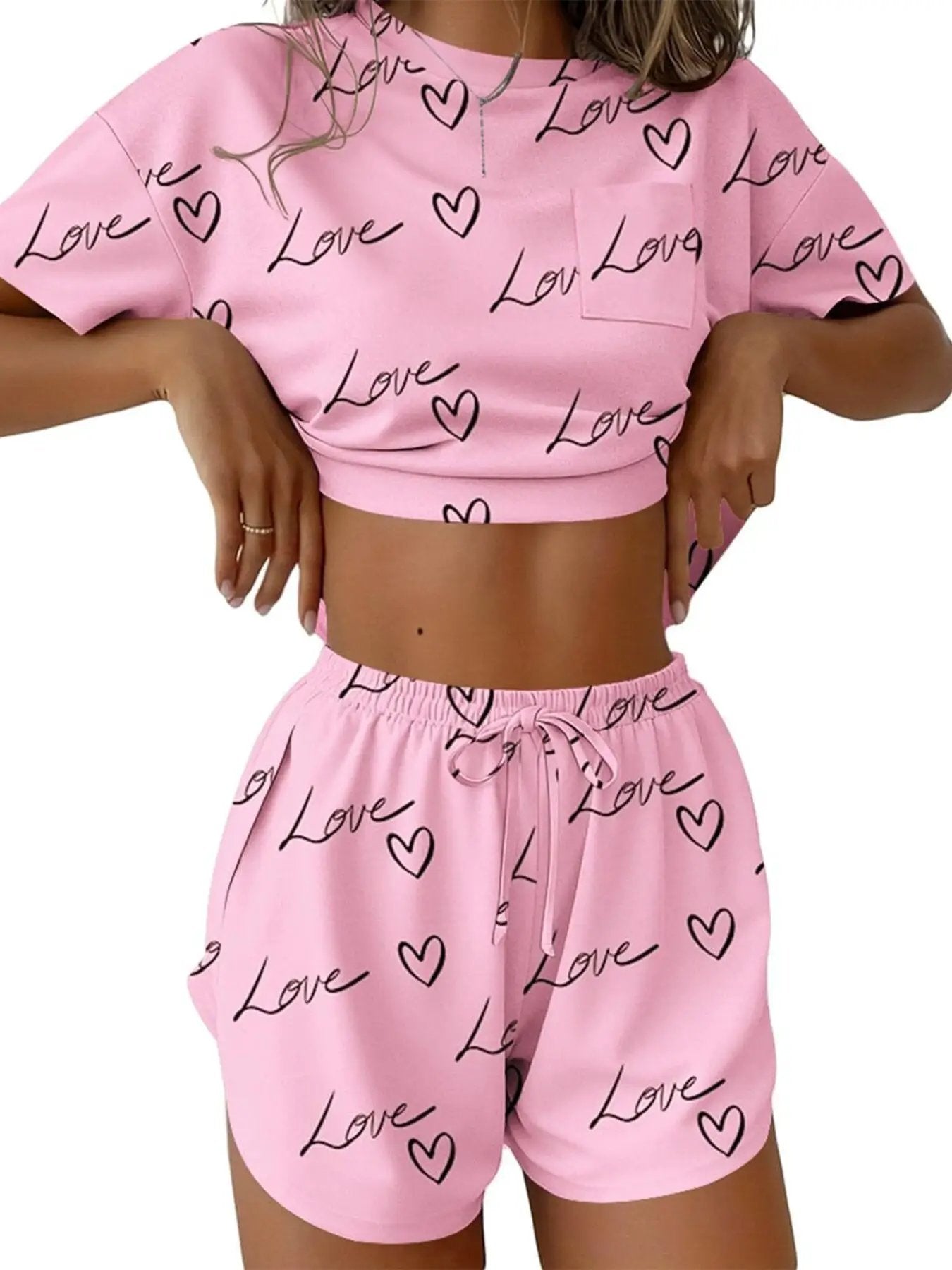 Printed Round Neck Tee and Shorts Set in pink by Trendsi with Love heart print