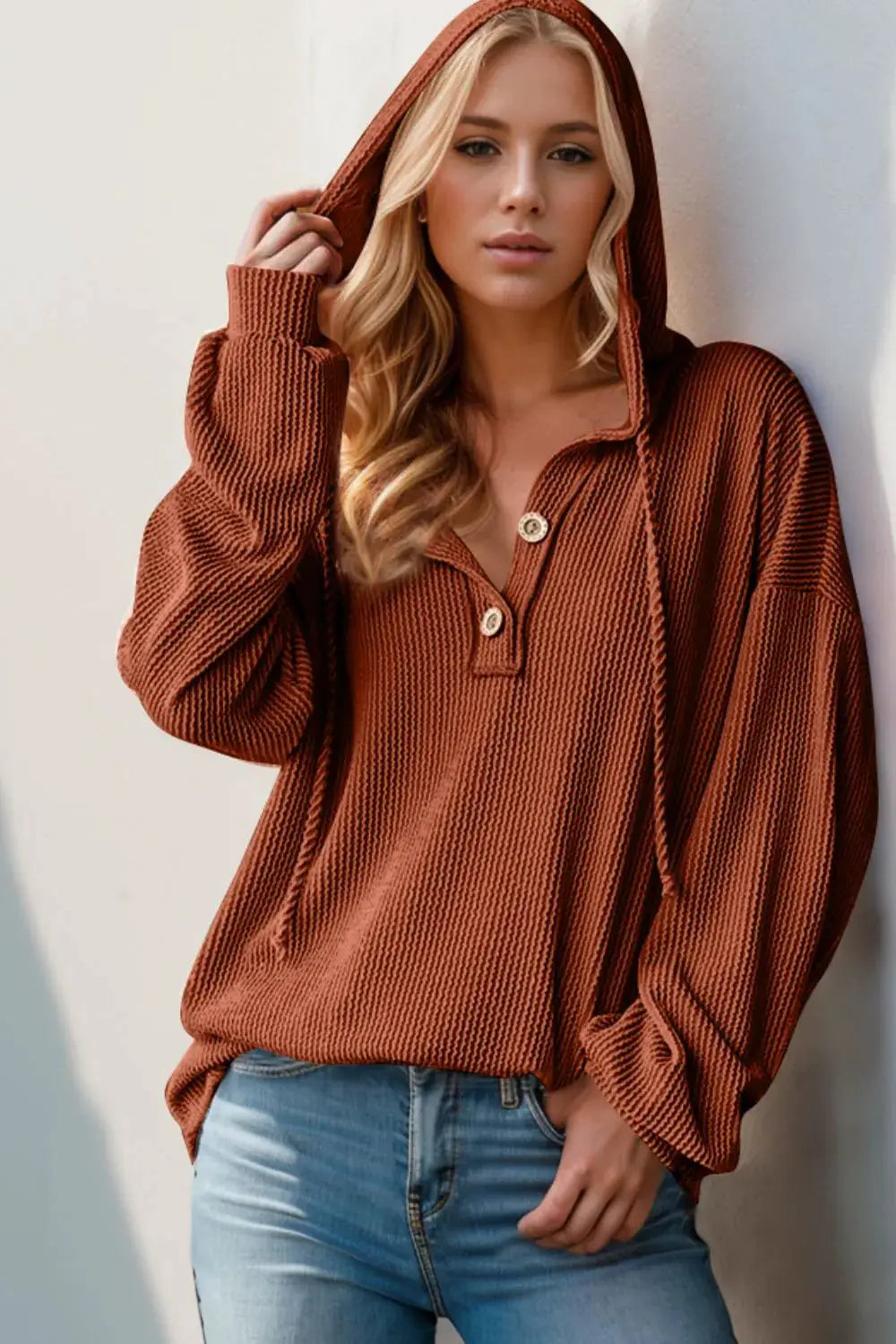 Double Take Full Size Half Button Long Sleeve Hoodie in rust knit with a two-button placket