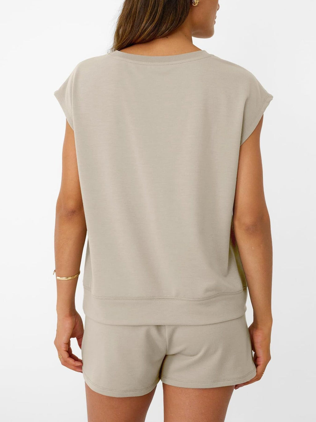 Round Neck Cap Sleeve Top and Shorts Set in beige by Trendsi, back view.